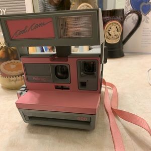 Polaroid camera with three photo shot films inside